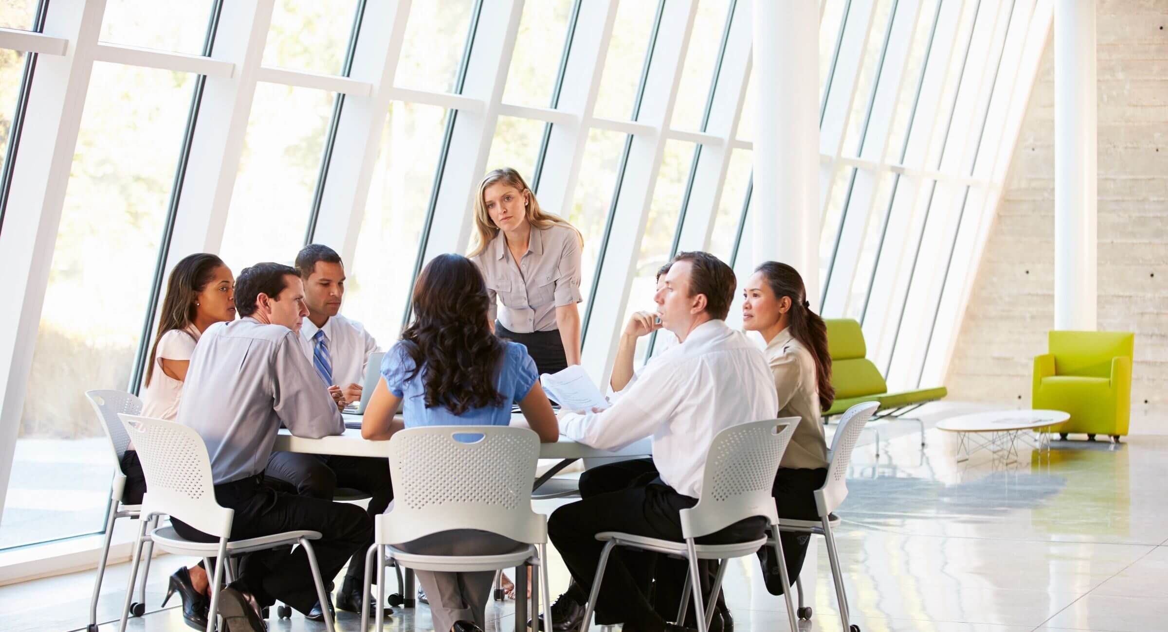 Business meeting in a modern conference room.